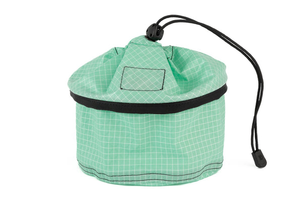 A Large Travel Tray in Seafoam (green with white grid) 200 Halcyon cinched up.
